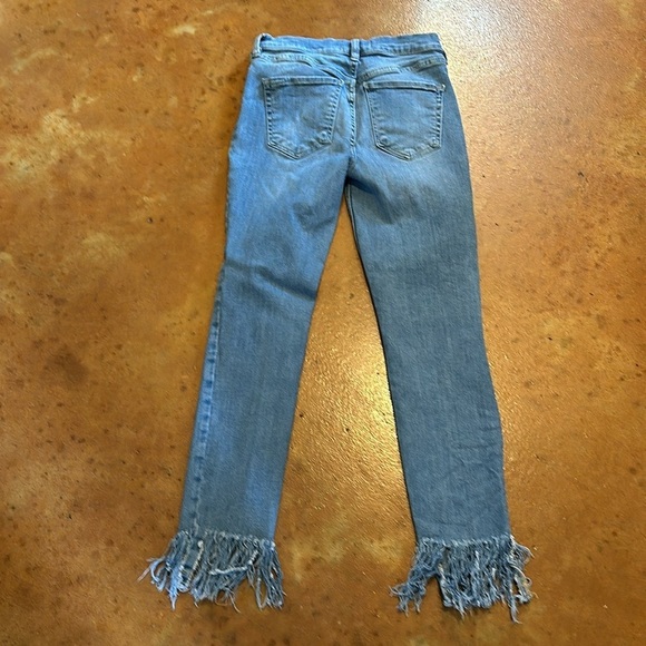 We The Free distressed and fringe hem Jean. Size 27. Waist flat 13”. Rise 9”. - Picture 6 of 8